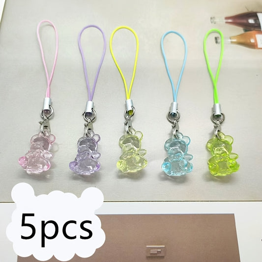 A Collection of 5 Adorable Clear Bear Mobile Phones, Keychains, And Backpack Charms.